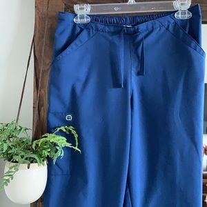 Medium WonderWink navy scrub pants.
